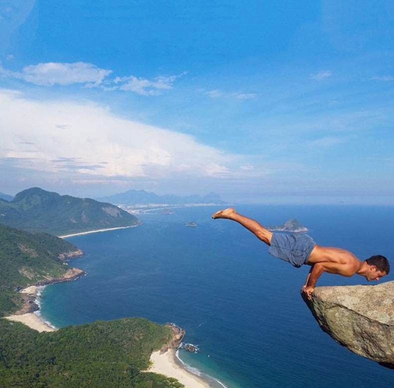 A person jumping off a cliff

Description automatically generated with low confidence